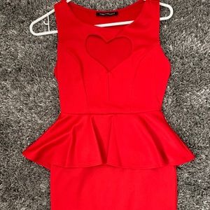 Red form fitting dress with heart cut out